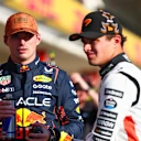 AUSTIN, TEXAS - OCTOBER 18: Pole position qualifier Max Verstappen of the Netherlands and Oracle Red Bull Racing and Second placed qualifier Lando Norris of Great Britain and McLaren talk in parc ferme during Qualifying ahead of the F1 Grand Prix of United States at Circuit of The Americas on October 18, 2025 in Austin, Texas. (Photo by Bryn Lennon - Formula 1/Formula 1 via Getty Images)