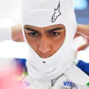 SHANGHAI, CHINA - MARCH 15: Arvid Lindblad of Great Britain and Visa Cash App Racing Bulls adjusts