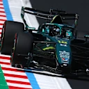 SUZUKA, JAPAN - MARCH 28: Lance Stroll of Canada driving the (18) Aston Martin F1 Team AMR26 Honda