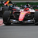 MONTREAL, QUEBEC - MAY 24: Charles Leclerc of Monaco driving the (16) Scuderia Ferrari SF-26 leads Isack Hadjar of France driving the (6) Oracle Red Bull Racing RB22 Red Bull Ford on track during the F1 Grand Prix of Canada at Circuit Gilles-Villeneuve on May 24, 2026 in Montreal, Quebec. (Photo by Rudy Carezzevoli/Getty Images)
