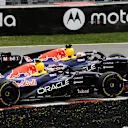 MONTREAL, QUEBEC - MAY 23: Max Verstappen of the Netherlands driving the (3) Oracle Red Bull Racing RB22 Red Bull Ford and Isack Hadjar of France driving the (6) Oracle Red Bull Racing RB22 Red Bull Ford battle for track position during the Sprint ahead of the F1 Grand Prix of Canada at Circuit Gilles-Villeneuve on May 23, 2026 in Montreal, Quebec. (Photo by Mark Thompson/Getty Images)