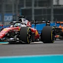MIAMI, FLORIDA - MAY 03: Charles Leclerc of Monaco driving the (16) Scuderia Ferrari SF-26 leads Lando Norris of Great Britain driving the (1) McLaren MCL40 Mercedes on track during the F1 Grand Prix of Miami at Miami International Autodrome on May 03, 2026 in Miami, Florida. (Photo by Chris Graythen/Getty Images)