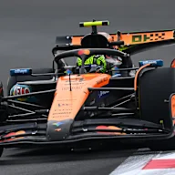 ABU DHABI, UNITED ARAB EMIRATES - DECEMBER 05: Lando Norris of Great Britain driving the (4)