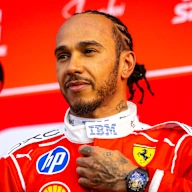 SHANGHAI, CHINA - MARCH 13: A smiling Lewis Hamilton of Great Britain and Scuderia Ferrari answers