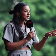SINGAPORE, SINGAPORE - SEPTEMBER 21: Ariana Bravo talks to the crowd on the fan stage prior to
