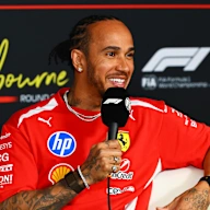 MELBOURNE, AUSTRALIA - MARCH 05: Lewis Hamilton of Great Britain and Scuderia Ferrari speaks in the