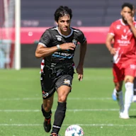 Carlos Sainz of Spain and the Atlassian Williams F1 Team participates in the Racing Stars Football