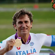LONGFIELD, ENGLAND - SEPTEMBER 07:  Alessandro Zanardi of Italy poses with his Gold medal after