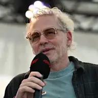 SUZUKA, JAPAN - MARCH 27: Jacques Villeneuve on stage prior to practice ahead of the F1 Grand Prix