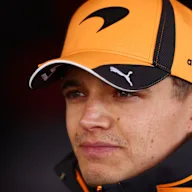 SUZUKA, JAPAN - MARCH 27: Lando Norris of Great Britain and McLaren looks on during practice ahead