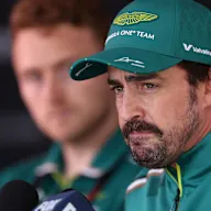 ZANDVOORT, NETHERLANDS - AUGUST 30: Tenth placed qualifier Fernando Alonso of Spain and Aston