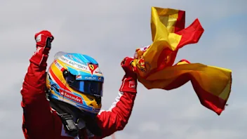 MONTMELO, SPAIN - MAY 12:  Fernando Alonso of Spain and Ferrari celebrates in parc ferme after