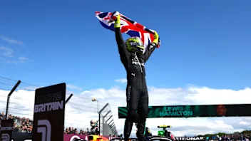 NORTHAMPTON, ENGLAND - JULY 07: Race winner Lewis Hamilton of Great Britain and Mercedes celebrates