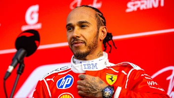SHANGHAI, CHINA - MARCH 13: A smiling Lewis Hamilton of Great Britain and Scuderia Ferrari answers