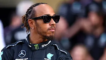 ABU DHABI, UNITED ARAB EMIRATES - NOVEMBER 23: Lewis Hamilton of Great Britain and Mercedes looks