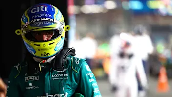 ABU DHABI, UNITED ARAB EMIRATES - NOVEMBER 25: 7th placed qualifier Fernando Alonso of Spain and