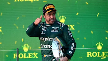 MELBOURNE, AUSTRALIA - MARCH 31: Fernando Alonso of Spain and Aston Martin F1 Team walks in the