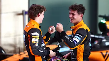 LUSAIL CITY, QATAR - OCTOBER 08: Second placed Oscar Piastri of Australia and McLaren and Third