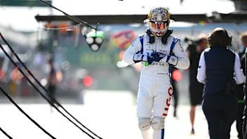 MELBOURNE, AUSTRALIA - MARCH 23: 18th placed qualifier Daniel Ricciardo of Australia and Visa Cash