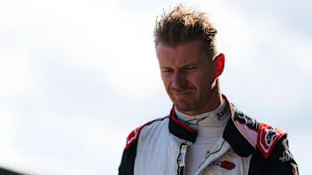 SPIELBERG, AUSTRIA - JUNE 28: 17th placed qualifier Nico Hulkenberg of Germany and Haas F1 walks in
