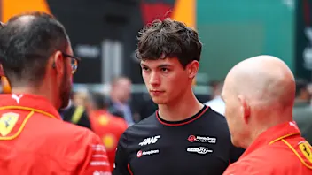 IMOLA, ITALY - MAY 16: Oliver Bearman of Great Britain and Haas F1 talks with his team in the