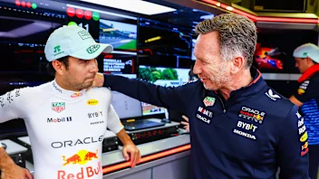 SPA, BELGIUM - JULY 28: Sergio Perez of Mexico and Oracle Red Bull Racing talks to Oracle Red Bull