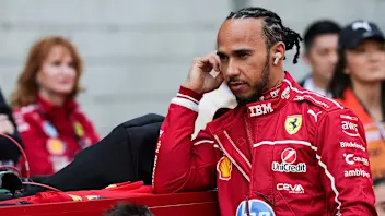 SHANGHAI, CHINA - MARCH 22: Lewis Hamilton of Great Britain and Scuderia Ferrari on the grid during
