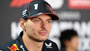 BUDAPEST, HUNGARY - JULY 31: Max Verstappen of the Netherlands and Oracle Red Bull Racing talks to
