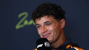Lando Norris of Great Britain and McLaren speaks in the Drivers