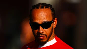 BARCELONA, SPAIN - MAY 30: Lewis Hamilton of Great Britain and Scuderia Ferrari looks on during