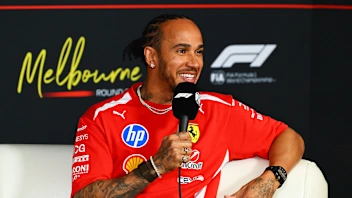 MELBOURNE, AUSTRALIA - MARCH 05: Lewis Hamilton of Great Britain and Scuderia Ferrari speaks in the