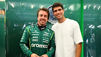 BAHRAIN, BAHRAIN - FEBRUARY 12: Carlos Alcaraz meets Fernando Alonso of Spain and Aston Martin F1