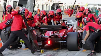 Ferrari's Spanish driver Carlos Sainz Jr arrives in the pit during the third practice session for