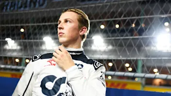SINGAPORE, SINGAPORE - SEPTEMBER 17: Liam Lawson of New Zealand and Scuderia AlphaTauri prepares to