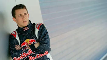 JEREZ, SPAIN - FEBRUARY 8:  Christian Klien of Austria and Red Bull poses in the team garage during