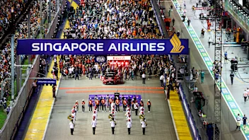 SINGAPORE, SINGAPORE - OCTOBER 02: A general view of the grid preparations during the F1 Grand Prix