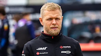 NORTHAMPTON, ENGLAND - JULY 7: Kevin Magnussen of Denmark and Haas F1 team looks on in the paddock