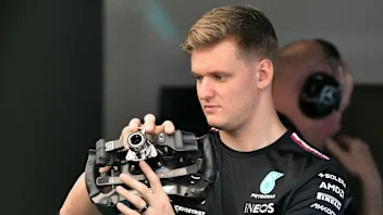 SINGAPORE, SINGAPORE - SEPTEMBER 19: Mick Schumacher of Germany, Reserve Driver of Mercedes walks