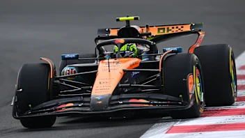 ABU DHABI, UNITED ARAB EMIRATES - DECEMBER 05: Lando Norris of Great Britain driving the (4)