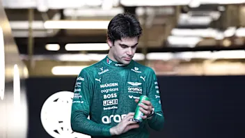 Lance Stroll of Canada drives the (18) Aston Martin Aramco Cognizant F1 Team AMR25 Mercedes during