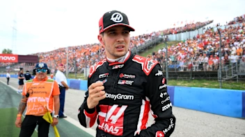 BUDAPEST, HUNGARY - AUGUST 03: Esteban Ocon of France and Haas F1 looks on on the grid during the