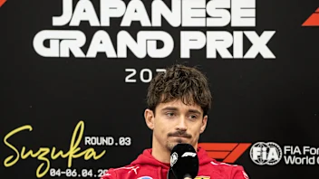SUZUKA, JAPAN - APRIL 03: Charles Leclerc of Monaco and Scuderia Ferrari looks on  during previews