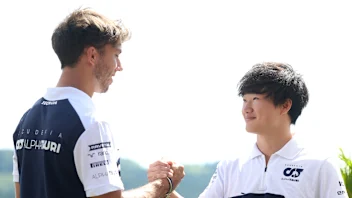 MARINA BAY STREET CIRCUIT, SINGAPORE - OCTOBER 01: Pierre Gasly, Scuderia AlphaTauri, with Yuki