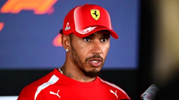 Lewis Hamilton of Scuderia Ferrari speaks at the media pen during media day of the Formula 1