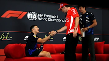 BAKU, AZERBAIJAN - SEPTEMBER 23: Isack Hadjar of France and Oracle Red Bull Racing greets Charles