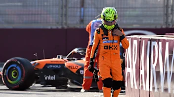 BAKU, AZERBAIJAN - SEPTEMBER 26: Lando Norris of Great Britain and McLaren looks dejected after