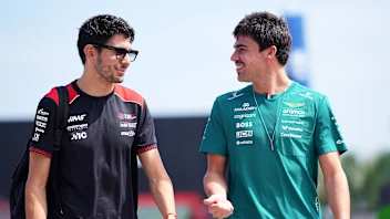 KUALA LUMPUR, MALAYSIA - OCTOBER 02: Esteban Ocon of France and Haas F1 and Lance Stroll of Canada