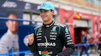 Mercedes' British driver George Russell celebrates after winning the Sprint race ahead of the 2026