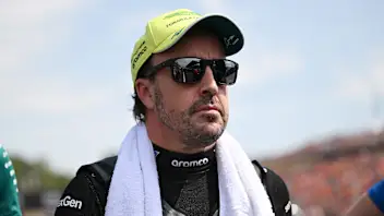BUDAPEST, HUNGARY - JULY 26: Fernando Alonso of Spain and Aston Martin F1 Team on the grid prior to