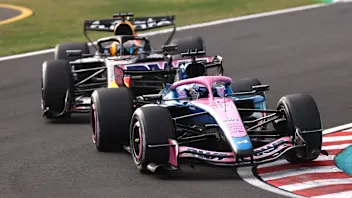 SUZUKA, JAPAN - MARCH 29: Pierre Gasly of France driving the (10) Alpine F1 A526 Mercedes leads Max